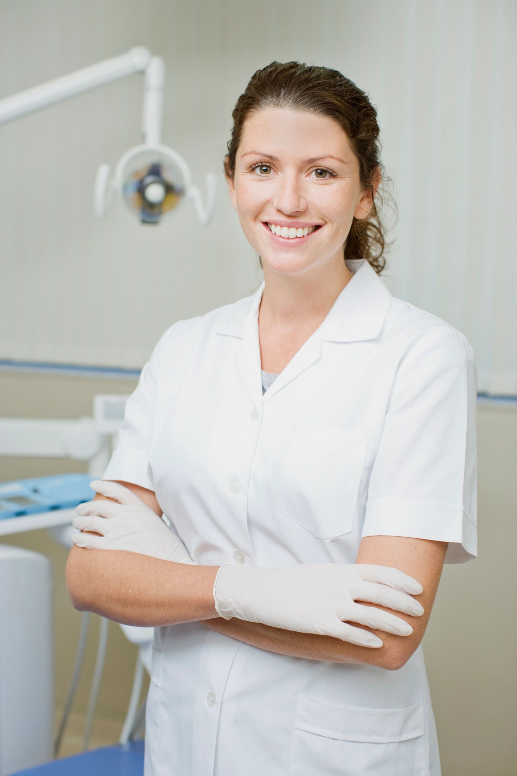 Clinician in a dental exam room
